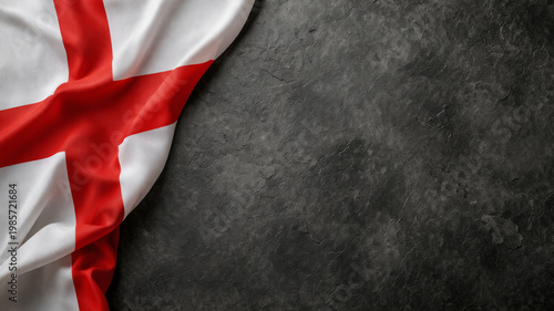 English flag on dark background for St George's Day celebration with copy space.