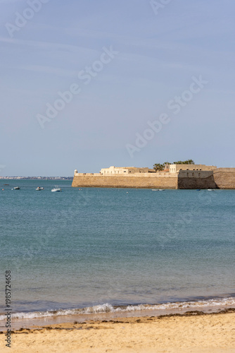 17th century Castle of Santa Catalina, sandy La Caleta beach by Atlantic Ocean, Cadiz, Spain, Andalusia