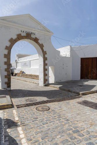 Fernando Quinones Promenade and Puerta de la Caleta, entrance gate to San Sebastian Castle and La Caleta beach, Cadiz, Spain, Andalusia