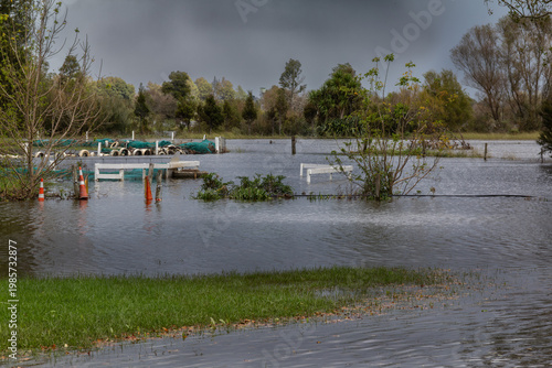 Flooded go-kart track and public park at Te Aroha, New Zealand. Flooding adjacent to Waihou River after Cyclone Vaianu, April 2026. Matamata-Piako District, Waikato region.