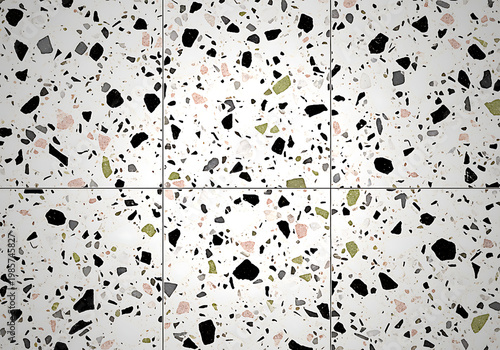 A white surface with black and colored specks