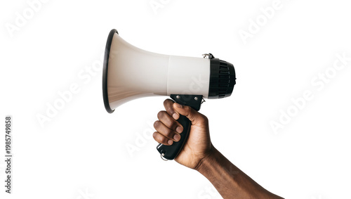Foto Dark-skinned hand holding a white and black megaphone, isolated on transparent b