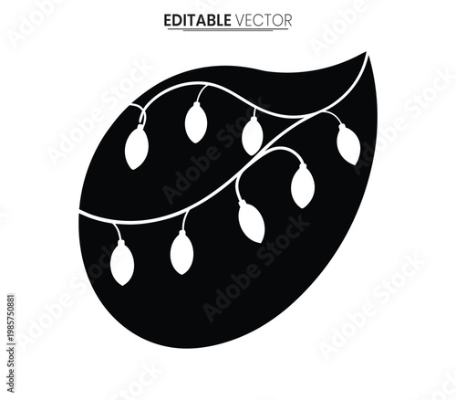 Festive leaf design adorned with string lights a striking black silhouette