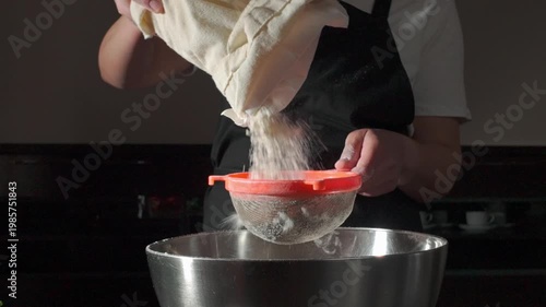 Chef Sifting Fresh Flour in Slow Motion for Baking Delicious Homemade Meals
