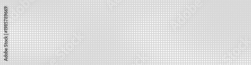 Wide white dot simple geometric texture of white halftone dots on a light gray backdrop