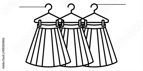 Three pleated skirts hanging on hangers in a continuous line art drawing style. Vector, illustration