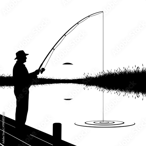 Silhouette of man fly fishing at sunset on calm lake with reflection