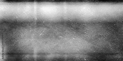 A dark and aged grunge metal texture background features a rough grey concrete surface with dirty vintage patterns for a weathered industrial design