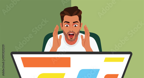 A man stares at a computer screen with a shocked and surprised expression on face