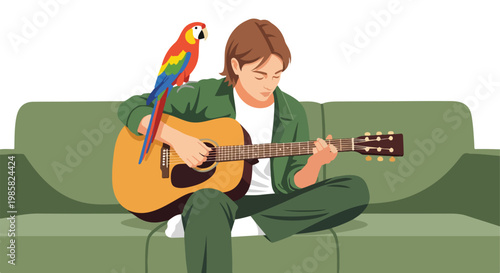 A young person sits on a green sofa playing an acoustic guitar with a parrot