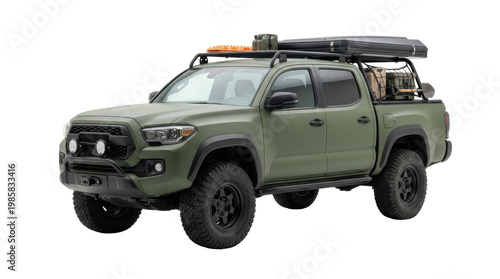 Rugged off-road adventure vehicle with roof rack and camping gear in isolated background