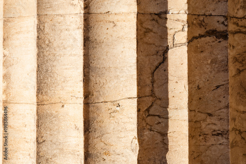 Background. Close-up. Part of a marble column in the Doric style. Acropolis, Athens, Greece