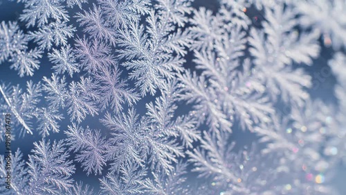 Macro closeup of detailed frost crystals on a frozen window, winter texture.