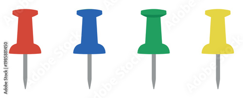 Colorful pushpins in a row, including red, blue, green, and yellow office supplies for organization and display.