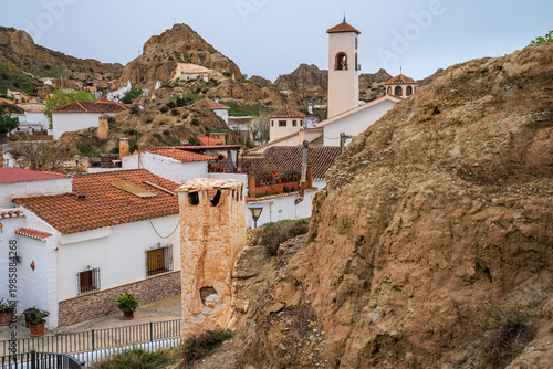 Foto Cave houses village in Guadix with bell tower, Andalusia, Spain