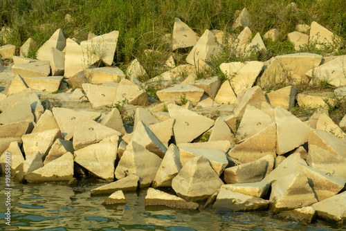 Cement Concrete CC blocks are strategically placed the riverbank