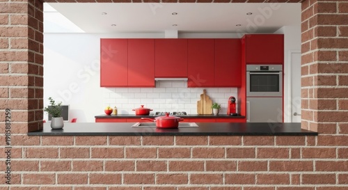 Modern kitchen with red cabinetry, viewable through a brick wall opening
