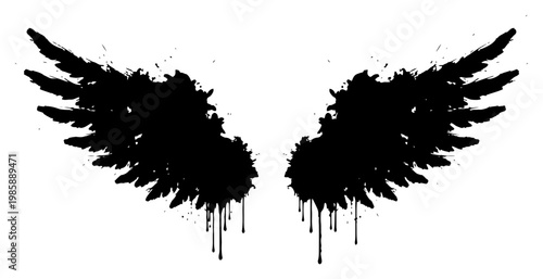 Angel wings silhouette with artistic ink splatters and messy paint drip effects