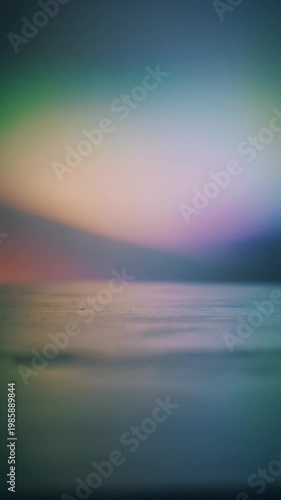 Soft moving gradient light transitioning smoothly across minimal surface, abstract cinematic background