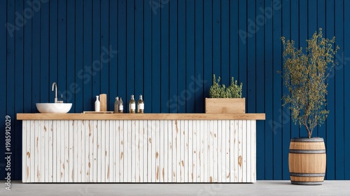 Modern minimalist kitchen island with sink and wooden barrel plant