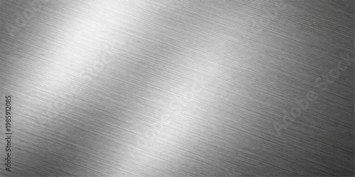 Industrial polished silver stainless steel background with a brushed metal plate texture and smooth shiny metallic titanium surface reflections