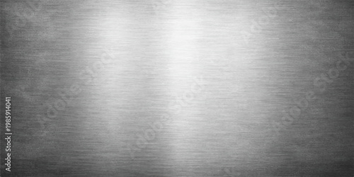 A polished stainless steel plate with a brushed metal texture creates a shiny silver metallic surface pattern, serving as a sleek industrial aluminum backdrop or grey alloy material wallpaper