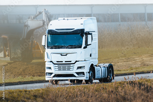 Konstfotografi Parked freight truck cab under clouds