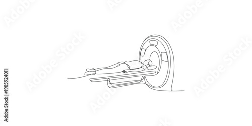 A person lying on a medical imaging table going into a ct scanner machine for a health checkup or diagnostic procedure