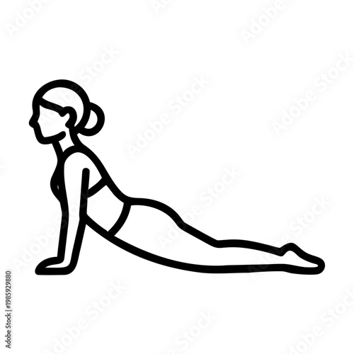 Woman doing cobra pose in yoga