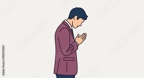 Man in a suit praying on Confederate Memorial Day with hands clasped