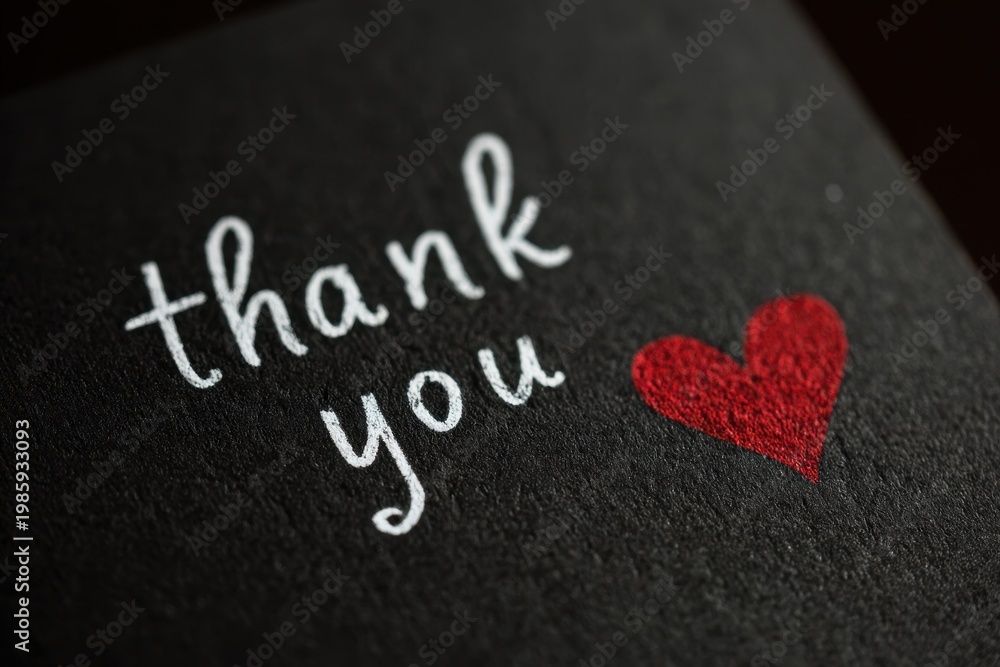 Fototapeta premium Warm handwritten gratitude message on charcoal paper with heart