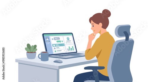 Portrait of a focused professional woman at laptop.