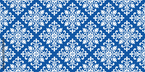 Seamless blue mosaic pattern with ornate floral ceramic tiles in Mediterranean style, perfect for vintage design projects and decorative backgrounds with intricate patterns