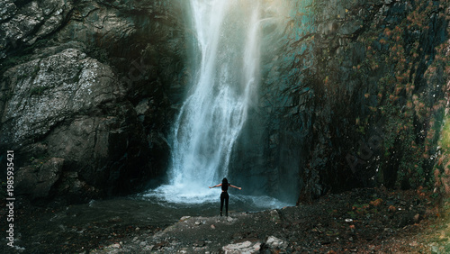 Girl infront of big Gveleti waterfall in Georgia