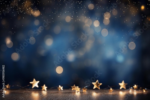 Golden star lights illuminating a dark wooden surface with sparkling blue bokeh