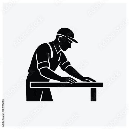Man writing or working at a desk