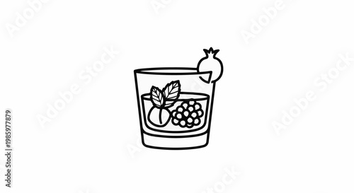 Refreshing glass cocktail with berries, mint, and pomegranate garnish