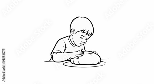 Young child focused on shaping a round object with both hands on a flat surface