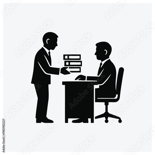 Two business professionals discussing or exchanging documents at a table