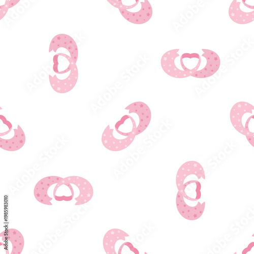 Seamless pattern of pink pacifiers with polka dots isolated on a transparent background