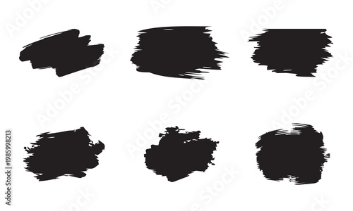 Set of black brush strokes and ink blots on white background for artistic graphic design elements