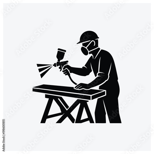 Worker spraying surface with equipment silhouette