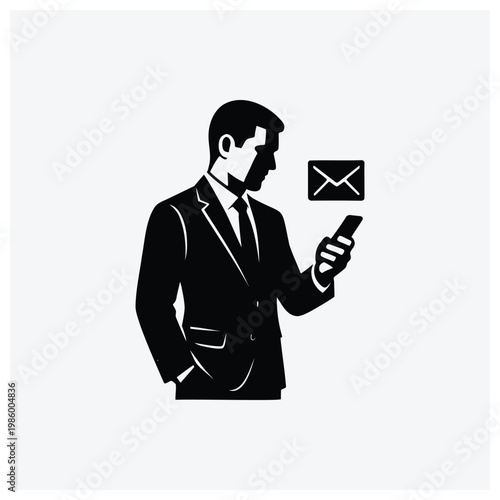 Businessman checking email on a mobile phone silhouette