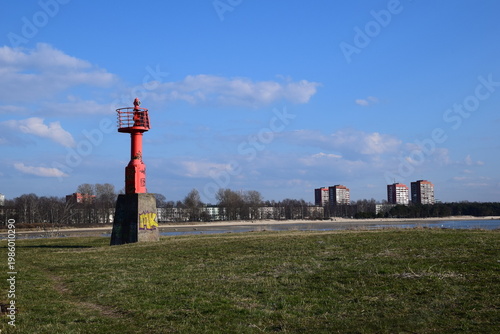 Reliable Red Navigation Aid Tower for Maritime Traffic in City Port Area