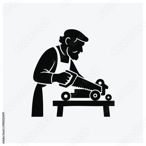 Silhouette of a craftsman using a saw on a workbench