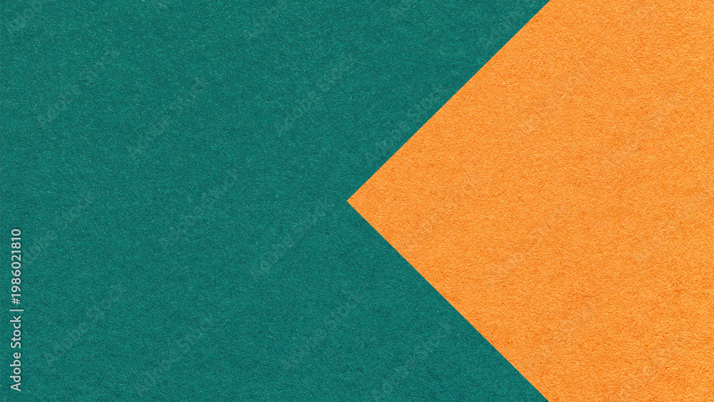 Fototapeta premium Textured dark emerald paper background with orange arrow, macro. Template with copy space for banner, presentation