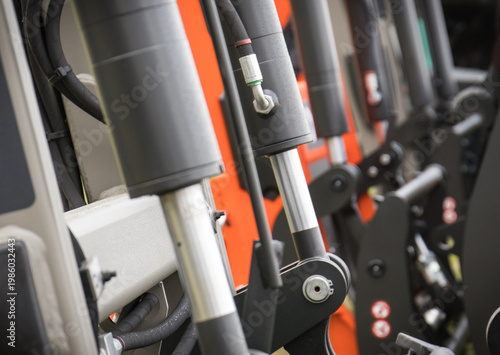 Black pistons or actuators in pneumatic or hydraulic machine. Technology