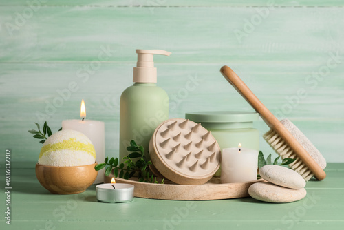Spa candles with bottle of ...