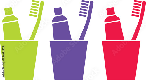 Three colorful toothbrushes and toothpaste tubes in separate containers