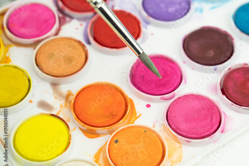 watercolour paints and brushes